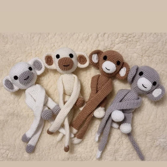 Hand crocheted monkey holder and toy - light brown